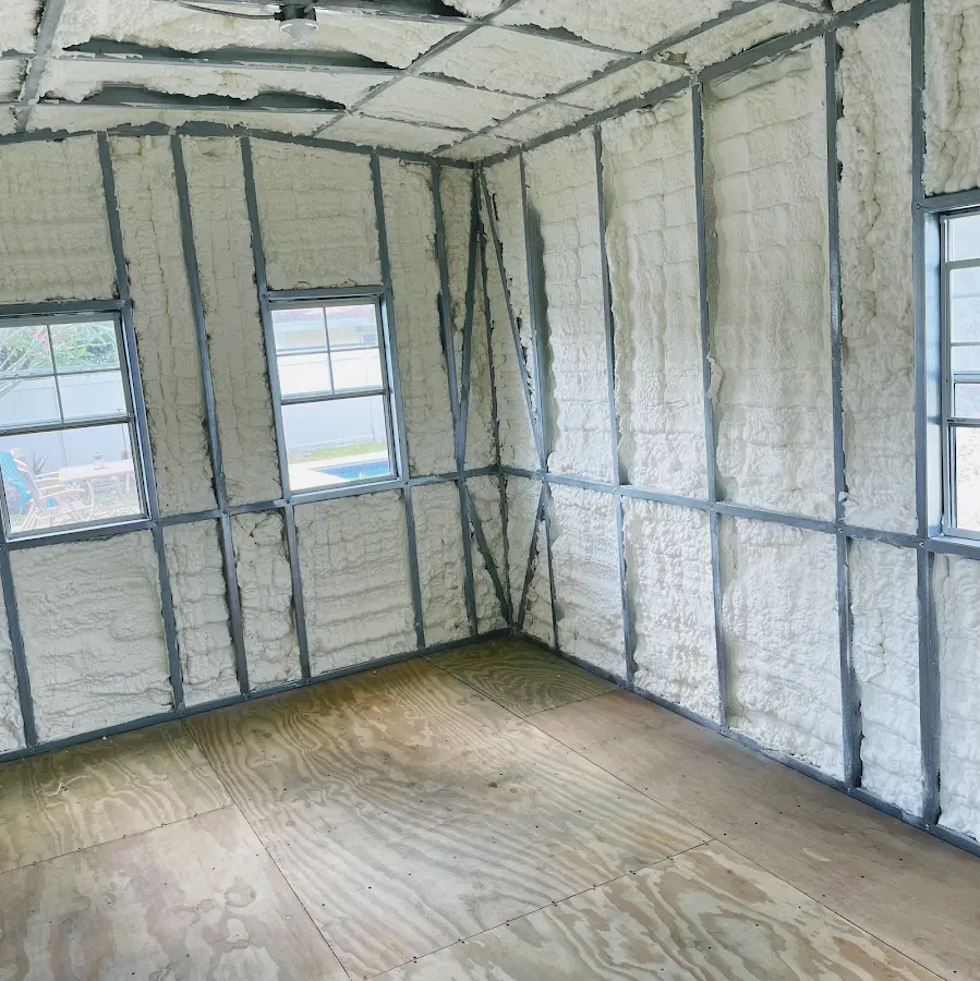 Closed-cell spray foam insulation applied to wall cavities in a residential project in Sauk Village
